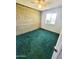 Bedroom featuring plush green carpeting, a ceiling fan, and a classic brick wall at 5016 W Sunrise Dr, Laveen, AZ 85339