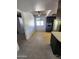 Bright dining area featuring tile floors adjacent to the kitchen at 5016 W Sunrise Dr, Laveen, AZ 85339