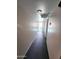Hallway with multiple doorways leading to other rooms in the home at 5016 W Sunrise Dr, Laveen, AZ 85339