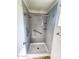 Accessible walk-in shower featuring safety bars and built-in shelving for added convenience and peace of mind at 5016 W Sunrise Dr, Laveen, AZ 85339