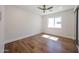 Minimalist bedroom with hardwood floors, a large window, and ample natural light at 5259 E Karen Dr, Scottsdale, AZ 85254