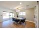 Bright dining area with modern lighting and access to the outdoor patio for seamless entertaining at 5259 E Karen Dr, Scottsdale, AZ 85254