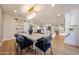 Stylish dining room with a modern table and chairs, open to the kitchen for easy entertaining at 5259 E Karen Dr, Scottsdale, AZ 85254