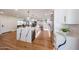 Spacious kitchen with a central island, stainless steel appliances, and hardwood floors, perfect for cooking at 5259 E Karen Dr, Scottsdale, AZ 85254