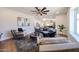 Bright living room with hardwood floors, a large area rug, and open floor plan at 5259 E Karen Dr, Scottsdale, AZ 85254