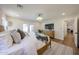 Inviting main bedroom with hardwood floors, comfortable bed, and natural light from the french doors at 5259 E Karen Dr, Scottsdale, AZ 85254