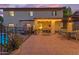 Relaxing backyard featuring a tiled patio, wrought iron fence surrounding a sparkling pool, and desert landscaping at 5930 E Fountain St, Mesa, AZ 85205