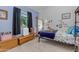 Cozy bedroom featuring playful decor, natural light, and a comfortable single bed at 5930 E Fountain St, Mesa, AZ 85205