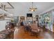 Inviting living room with hardwood floors, staircase, and ample natural light at 5930 E Fountain St, Mesa, AZ 85205