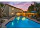 Sparkling pool with lounge chairs and a patio, perfect for outdoor relaxation and entertaining at 5930 E Fountain St, Mesa, AZ 85205