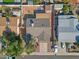 Overhead shot of a home with desert landscaping, a patio, and a shed in the backyard at 7132 W Vermont Ave, Glendale, AZ 85303
