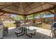 Community barbecue area with multiple grills and seating at 7726 E Baseline Rd # 154, Mesa, AZ 85209