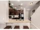 Kitchen with stainless steel sink, granite countertops and dark cabinets at 7726 E Baseline Rd # 154, Mesa, AZ 85209