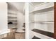 Walk-in pantry with ample shelving and storage space at 119 E Palomino Dr, Tempe, AZ 85284