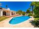 Charming backyard with a refreshing pool, spa, and beautifully landscaped surroundings at 119 E Palomino Dr, Tempe, AZ 85284