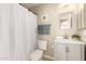 Clean bathroom with vanity, mirror, and shower showcasing modern fixtures and neutral tones at 1343 E Amberwood Dr, Phoenix, AZ 85048