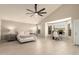 Bright bedroom with vaulted ceilings, neutral tones, and a picturesque view at 1343 E Amberwood Dr, Phoenix, AZ 85048