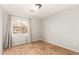Neutral bedroom with window and neutral tile floor at 1381 W Gary Dr, Chandler, AZ 85224