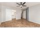 Bedroom featuring tile floors, a ceiling fan, and a closet for storage and organization at 1381 W Gary Dr, Chandler, AZ 85224