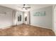 Spacious bedroom with tile floors, dual windows, and neutral wall colors providing a blank canvas for decor at 1381 W Gary Dr, Chandler, AZ 85224
