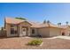 Charming single-story home featuring a tile roof, well-maintained landscaping, and a welcoming front entrance at 1381 W Gary Dr, Chandler, AZ 85224