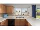 Kitchen with a stainless steel sink, laminate countertops, and a view to the backyard through a bright window at 1381 W Gary Dr, Chandler, AZ 85224