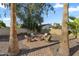 Inviting backyard fire pit area with comfortable seating, perfect for relaxing evenings under the stars at 14221 N 43Rd St, Phoenix, AZ 85032