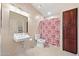 Bathroom features modern fixtures, vanity, toilet, and shower with privacy curtain at 14221 N 43Rd St, Phoenix, AZ 85032