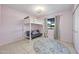 Pink bedroom featuring a bunk bed with a futon and an eye-catching decorative ceiling fan at 14221 N 43Rd St, Phoenix, AZ 85032
