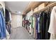 Spacious walk-in closet with ample hanging and storage space for any wardrobe at 14221 N 43Rd St, Phoenix, AZ 85032