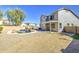 Backyard oasis featuring a pool, hot tub, and manicured landscaping with an expansive patio at 14719 N 176Th Ave, Surprise, AZ 85388