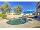 Sparkling pool with inviting cool, blue water, set in a backyard with mature trees, perfect for relaxation at 14719 N 176Th Ave, Surprise, AZ 85388