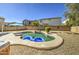 Backyard pool featuring clear water, landscaping, privacy fence, and neighborhood views for relaxation at 14719 N 176Th Ave, Surprise, AZ 85388