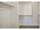 The walk-in closet is designed with shelves and bars for optimal storage and organization at 14719 N 176Th Ave, Surprise, AZ 85388