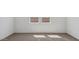 Bedroom features carpet flooring and two windows at 1534 E Mason Dr, Casa Grande, AZ 85122