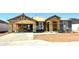 New construction home featuring a two-car garage and a modern design at 1534 E Mason Dr, Casa Grande, AZ 85122