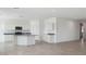 Spacious living room features white cabinets and stainless steel appliances at 1534 E Mason Dr, Casa Grande, AZ 85122