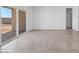 Spacious living room featuring tile floors and sliding glass doors to the backyard at 1540 E Mason Dr, Casa Grande, AZ 85122
