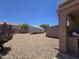Large backyard with a shed, outdoor kitchen, and RV parking area at 15656 W Desert Mirage Dr, Surprise, AZ 85379