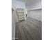 Spacious walk-in closet with carpet, shelving, and a doorway to the bathroom at 15656 W Desert Mirage Dr, Surprise, AZ 85379