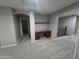 This home's loft features neutral walls, carpet flooring, and a desk with granite countertops at 15656 W Desert Mirage Dr, Surprise, AZ 85379