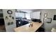 Well-lit kitchen boasting butcher block counters, white cabinets, and stainless steel appliances at 17200 W Bell Rd # 1622, Surprise, AZ 85374