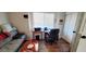 Functional office with a desk, computer, and comfortable seating for work or study at 17200 W Bell Rd # 1622, Surprise, AZ 85374