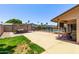 Expansive backyard with a pool, fenced perimeter, and ample patio space for outdoor living and entertaining at 1809 S Heritage --, Mesa, AZ 85210