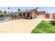 Large backyard featuring a pool, covered patio, and ample space for outdoor activities and relaxation at 1809 S Heritage --, Mesa, AZ 85210