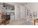 Bright and organized closet with built-in shelves and hanging rods, providing ample storage space at 1809 S Heritage --, Mesa, AZ 85210