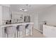 Modern kitchen with stainless steel appliances, breakfast bar with seating, and stylish backsplash at 1809 S Heritage --, Mesa, AZ 85210
