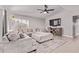 Bright and inviting living room featuring a plush sectional sofa and modern decor at 1809 S Heritage --, Mesa, AZ 85210