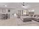 Open-concept living room and dining area with neutral color palette and stylish furnishings at 1809 S Heritage --, Mesa, AZ 85210