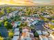 Neighborhood view displays homes surrounding trees in a suburban neighborhood from an aerial perspective at 1913 S River Dr, Tempe, AZ 85281